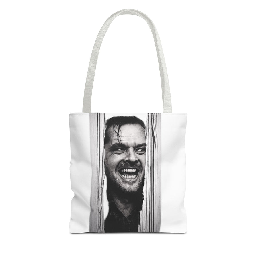 Naturweiße Tote Bag mit schwarzweißem Porträt eines wild grinsenden Mannes zwischen Holzleisten.