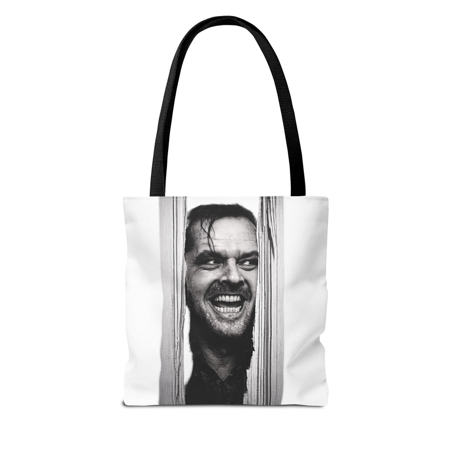 Naturfarbene Tote Bag mit schwarzweißem Porträt eines grinsenden Mannes hinter Holzlatten.