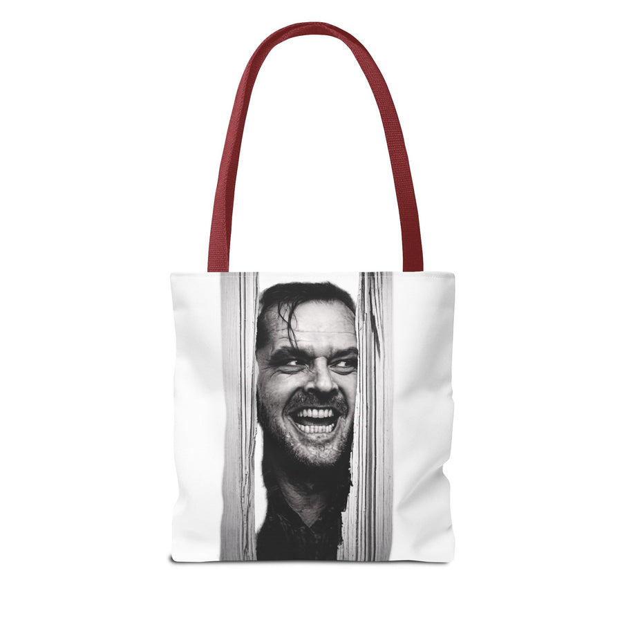 Naturfarbenе Tote Bag mit weinroten Henkeln und schwarzweißem Filmszenen-Motiv.