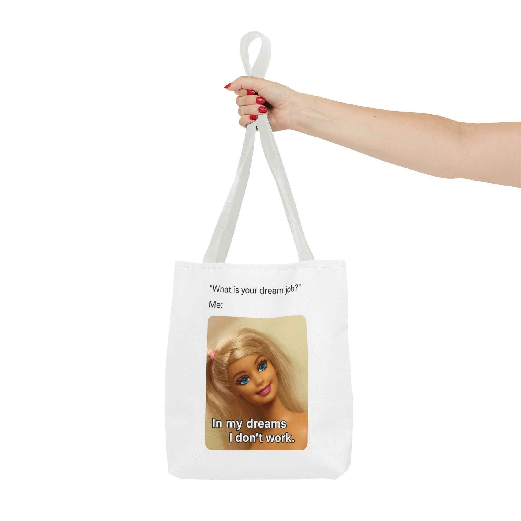 Schwarze Tote Bag mit Dream Job Charming Smile Design, seitlich fotografiert, Produkt von True Insights