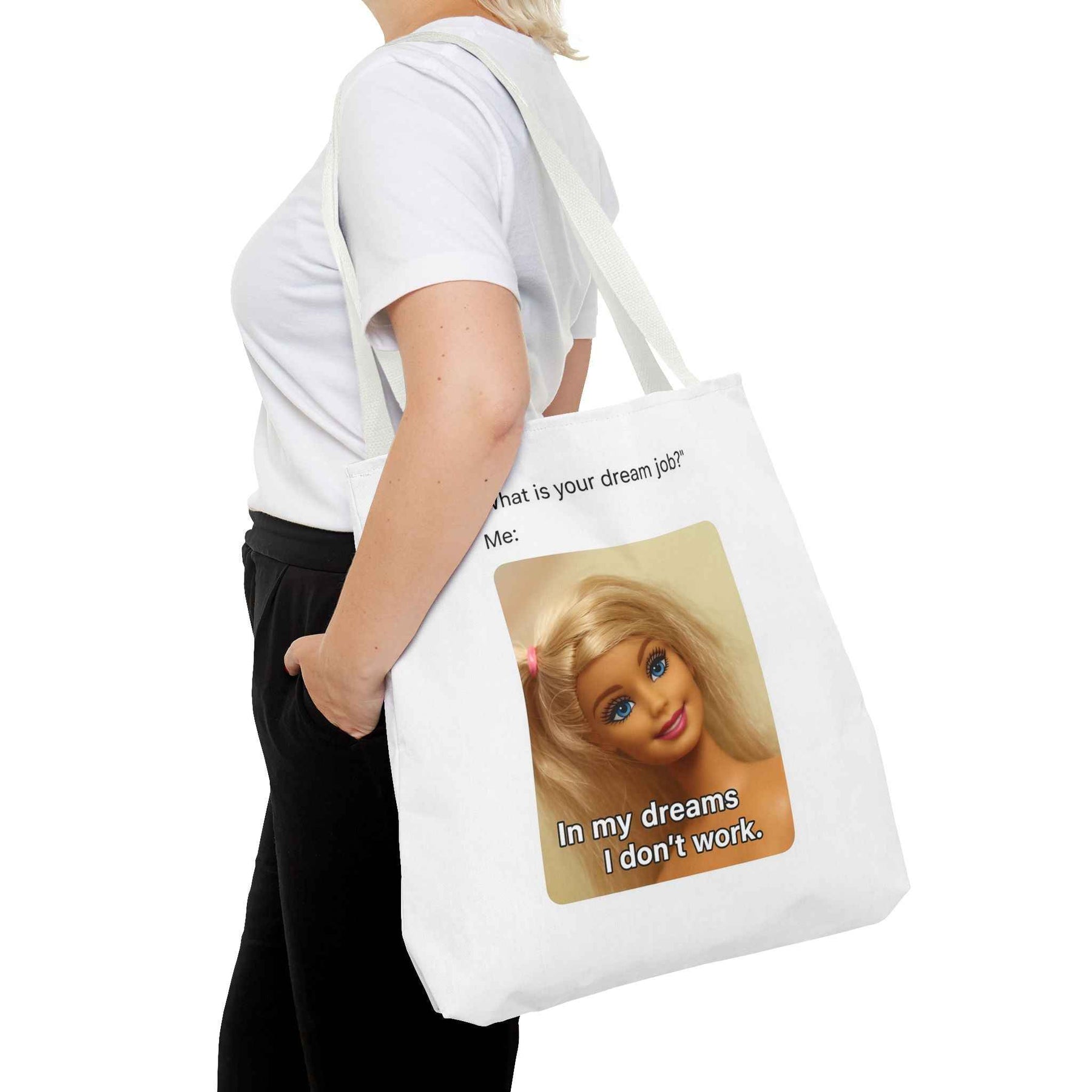 Schwarze Tote Bag mit dem Motiv Dream Job Charming Smile, Frontansicht, leicht seitliche Perspektive, von True Insights