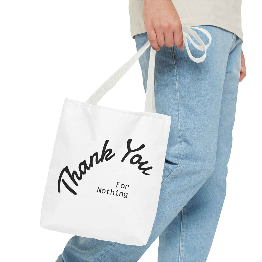 Schwarze Tote Bag mit weißem Thank You for Nothing Aufdruck in leicht schräger Perspektive von True Insights