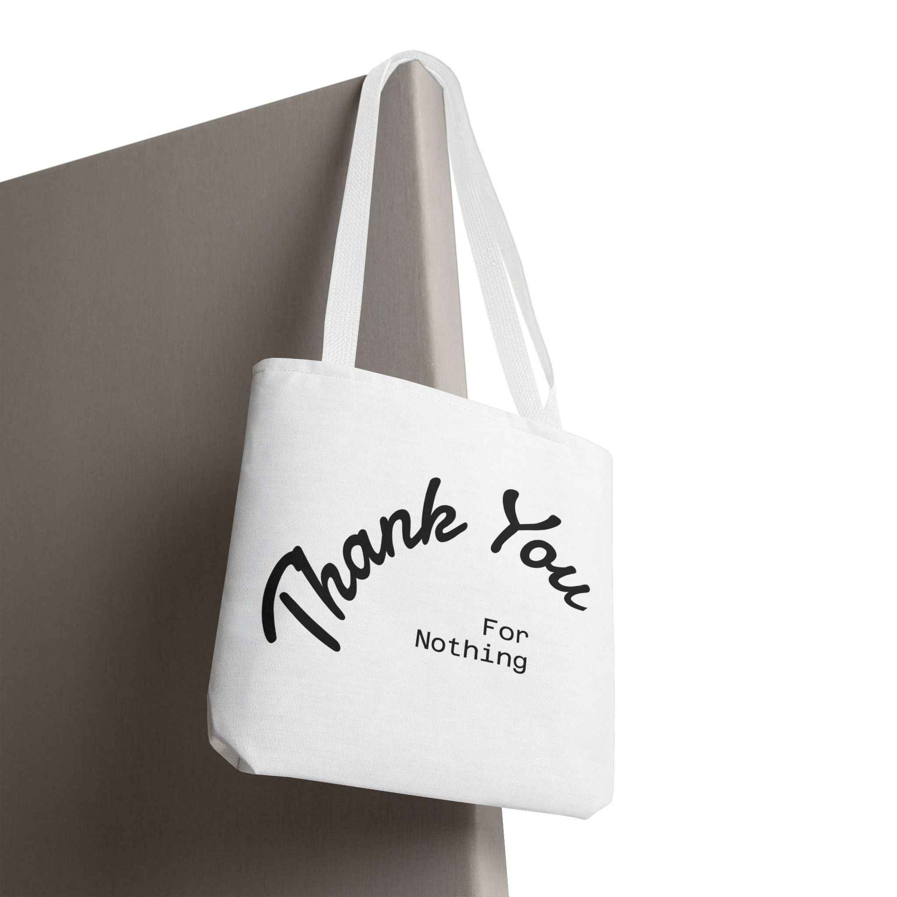 Schwarze Tote Bag mit dem Schriftzug Thank You for Nothing, fotografiert in leichter Schräge, von True Insights