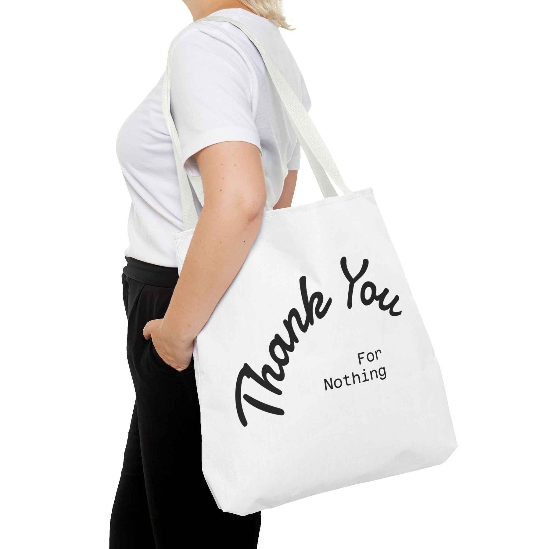 Schwarze Tote Bag mit weißem Thank You for Nothing Schriftzug, leicht schräg von vorne fotografiert, von True Insights